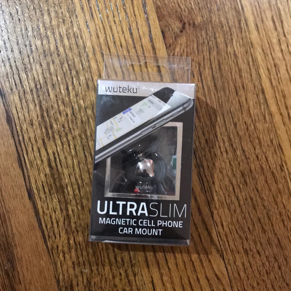 Magnetic cell phone holder for car